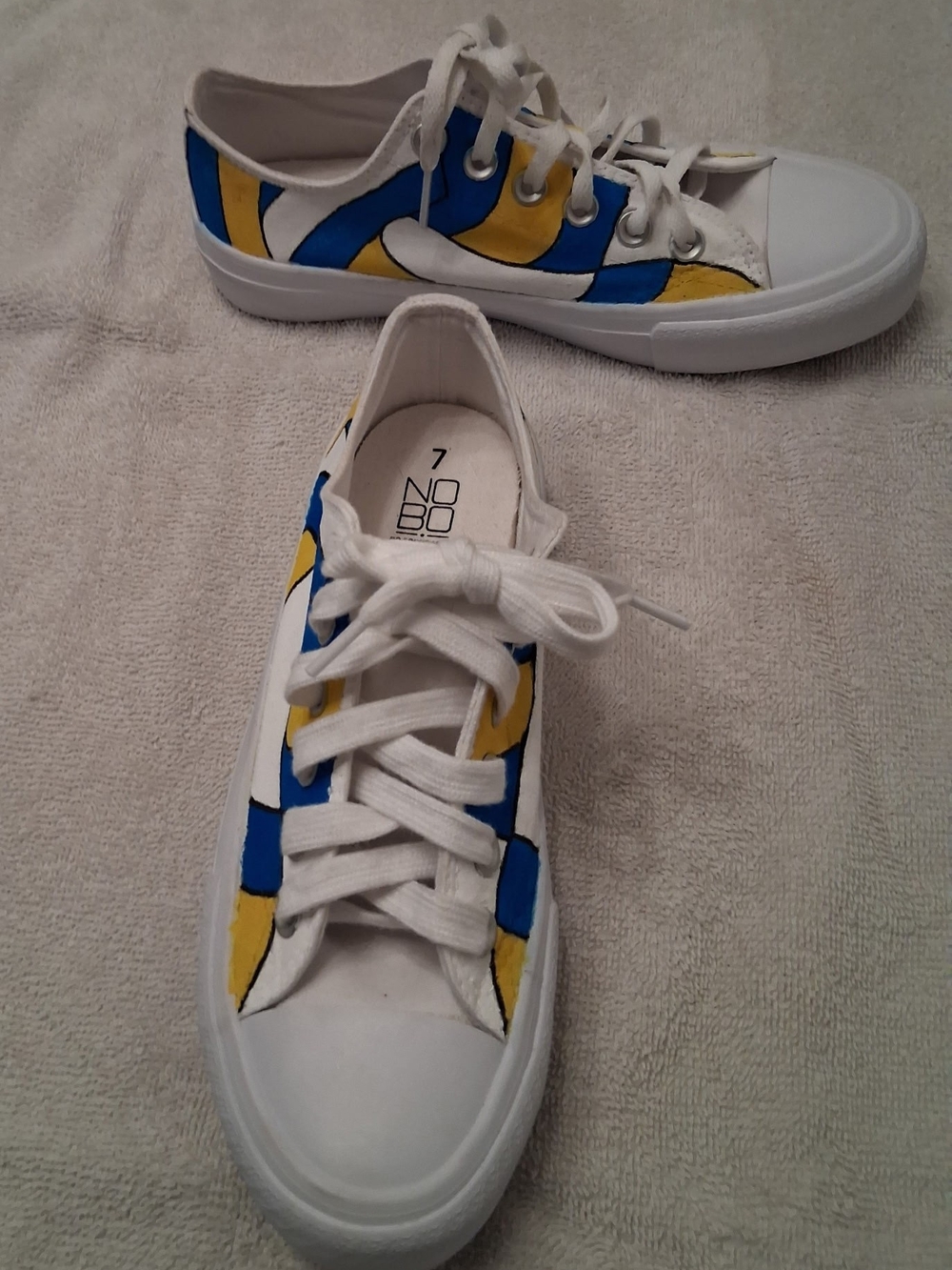 NOBO White Sneakers with Blue and Yellow Wave Accents